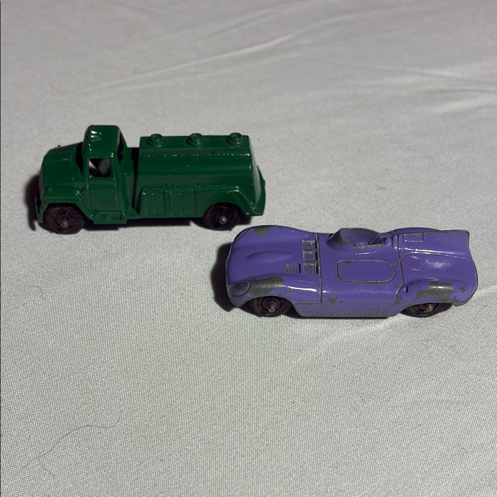 Vintage TootsieToy Chicago USA die-cast car duo.